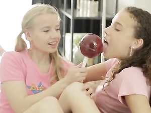 Sucking A Giant Lollipop And Eating Her Shaved Puss